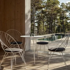 Mesa de café Desirée, Laminado , ø110cm, base lacada en*Swedese